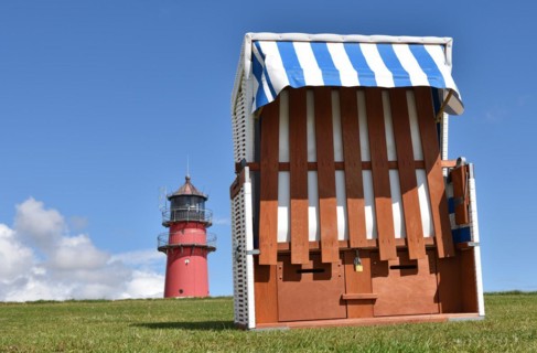 Beach chair in front of Buesum lighthouse
