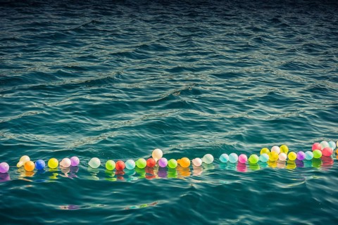 Balloon on a string on water for shooting game