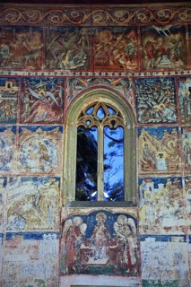 Frescoes on the outer wall. The Voronet Monastery