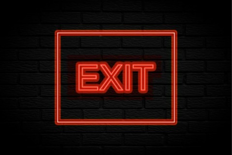 Exit. 3d lettering. Neon lights on black brick background
