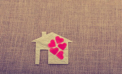 Model house and a heart shape beside it