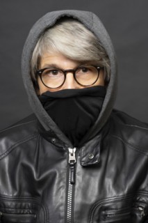 Older man with mask and winter outfit