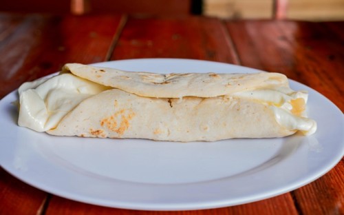 Traditional cheese dish with pickled onion and cream. Traditional Cheese with Pickled Onion