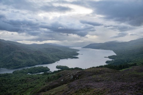 View over Loch Katrine from Ben Aan under cloudy skies