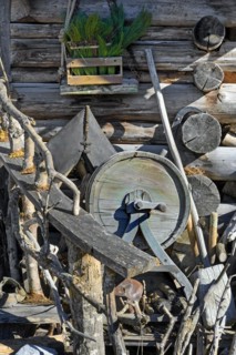 Detail of a Tyrolean alpine hut with old butter churn near Kempten