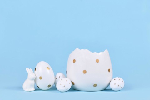 White easter eggs with golden dots