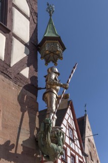 Figure of St. George as dragon slayer on Pilatus House