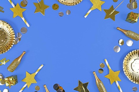 New year border with golden party items on blue background with copy space
