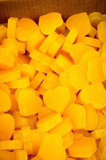 Colorful fragrant bars of soap in the shape of heart and