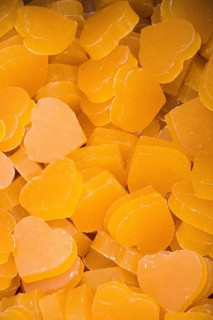 Colorful fragrant bars of soap in the shape of heart and