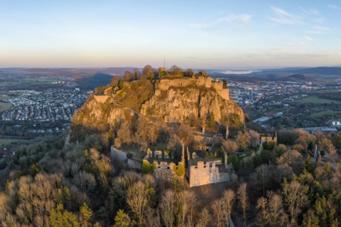 The volcanic cone Hohentwiel with the castle ruins illuminated by the evening sun