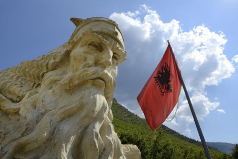 Skanderbeg monument with waving flag with double-headed eagle