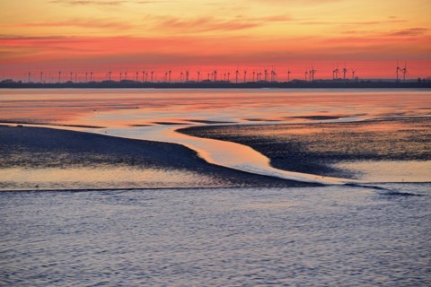 View over the Wadden Sea at low tide to the mainland