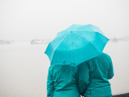 Tourists with umbrella