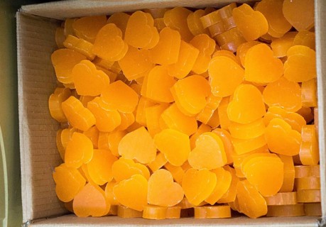 Colorful fragrant bars of soap in the shape of heart and