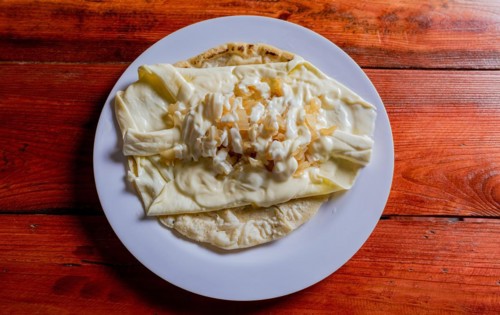 Top View of traditional Cheese with Pickled Onion