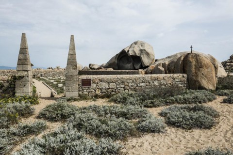 Granite rocks and cemetery on the beach