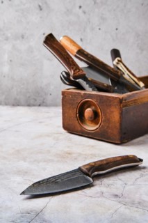 Wooden box with different kinds of knives