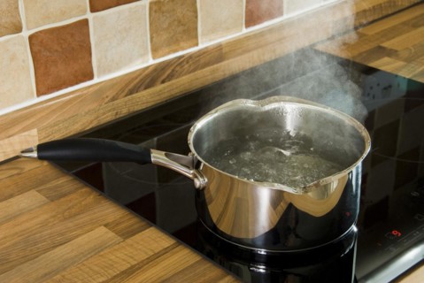 Stainless steel saucepan of boiling water