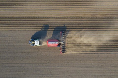 Aerial view over tractor with pneumatic seed drill