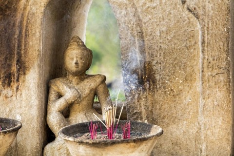 Burning incense sticks at the Hsinbyume pagoda