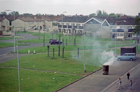 Burning rubbish in a bin
