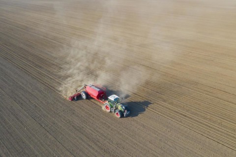 Aerial view over tractor with pneumatic seed drill