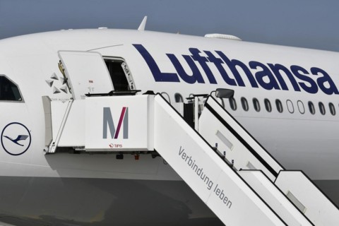 Lufthansa aircraft with passenger stairs on the east apron in front of Terminal 2