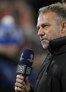 National coach Coach Hans-Dieter Hansi Flick interviewed by microphone Logo DAZN