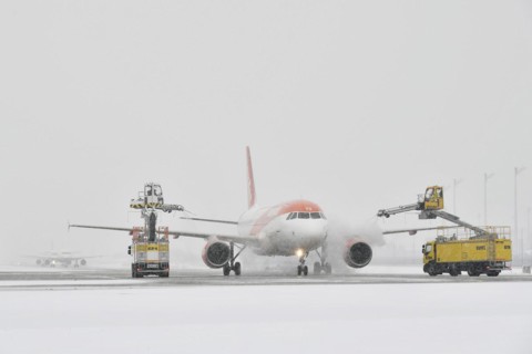 Aircraft de-icing in winter in front of take-off