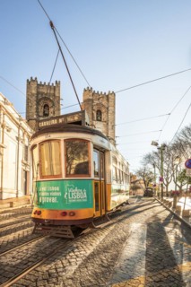The Historic Streets with the famous tram 28 in front of Lisbon Cathedral