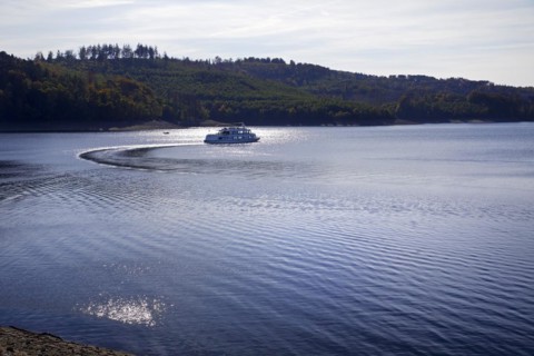 Sorpesee with the motor ship MS Sorpesee in the backlight