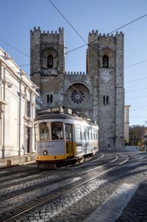 The Historic Streets with the famous tram 28 in front of Lisbon Cathedral