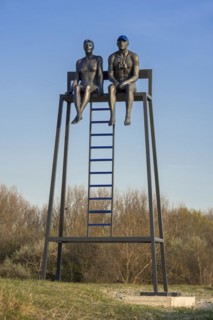 Bronze sculpture Soccoristas de Biarritz X-X by Aurora Canero in the dunes along the North Sea coast at Knokke-Heist