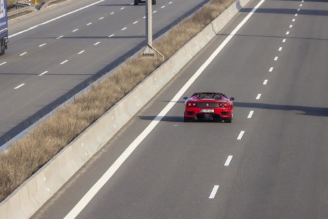 Ferrari drives in the overtaking lane when the motorway is clear