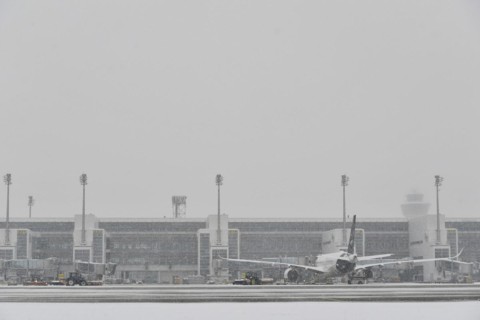 Snow clearing machines and snow removal tractors clearing snow on the east apron