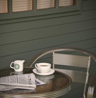 Cup of coffee and newspaper