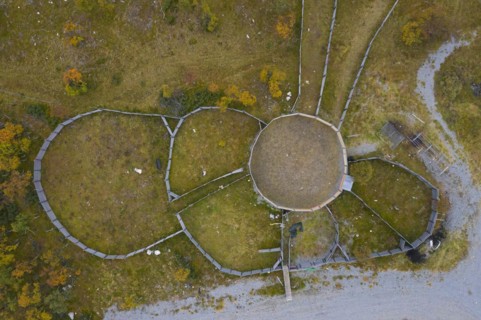 Aerial view over fences of Sami herders corral for trapping reindeer in autumn at Haerjedalen