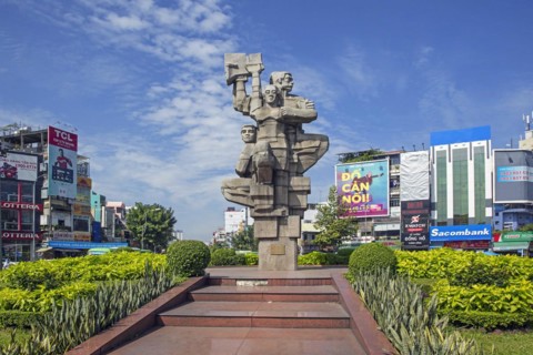 Monument to the Workers Struggle on roundabout in the town centre of Ho Chi Minh City