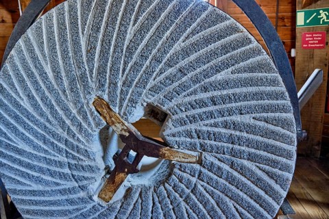 Millstone on display in the historic Sanssouci windmill