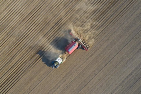 Aerial view over tractor with pneumatic seed drill