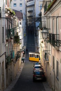 Old houses in narrow alleys and historic streets. Old house fronts in the morning and in the sunshine