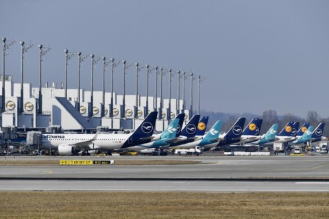 Lufthansa and Air Dolomiti aircraft parked in position at Terminal 2