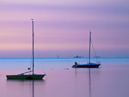 Two sailing boats on the North Sea in the evening light