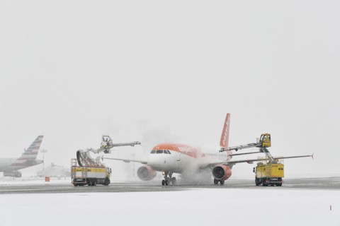 Aircraft de-icing in winter in front of take-off
