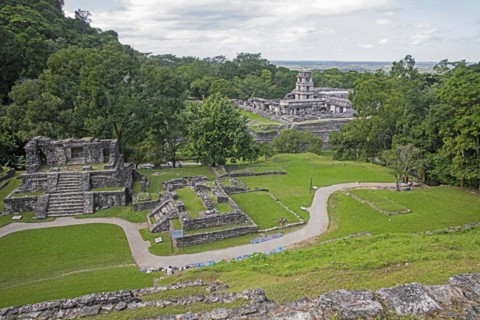 Aerial view over temple ruins and the Palace with Observation Tower at the pre-Columbian Maya civilization site of Palenque