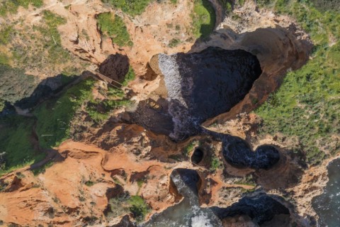 Caves at Praia da Marinha, rocks and cliffs, steep coast in the Algarve, Portugal, Europe