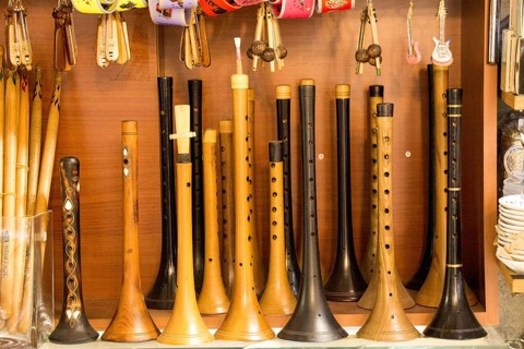 Dozens of handmade wooden flutes or shrill pipe