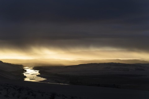 Thunderstorm over the Orange River, also known as the Orange River, on the border between Namibia and South Africa, Oranjemund, Sperrgebiet National Park, also known as Tsau ÇKhaeb National Park, Nam...