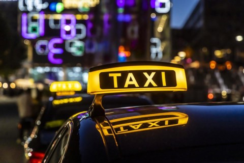 Taxi stand with taxi in the city centre at night, symbol photo, Stuttgart, Baden-Wuerttemberg, Germany, Europe